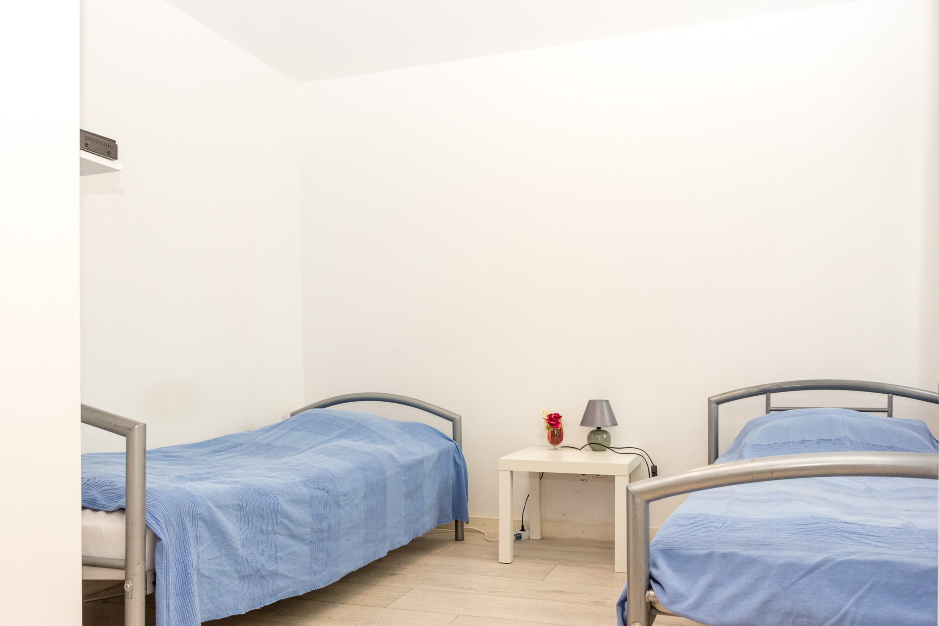 schlafzimmer-zwei-betten-ferienwohnung-dormtund-innenstadt